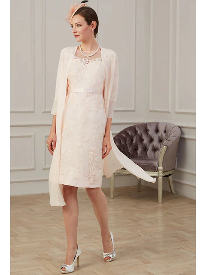 Close-up of the delicate appliques and ruching on the elegant chiffon Mother of the Bride dress.