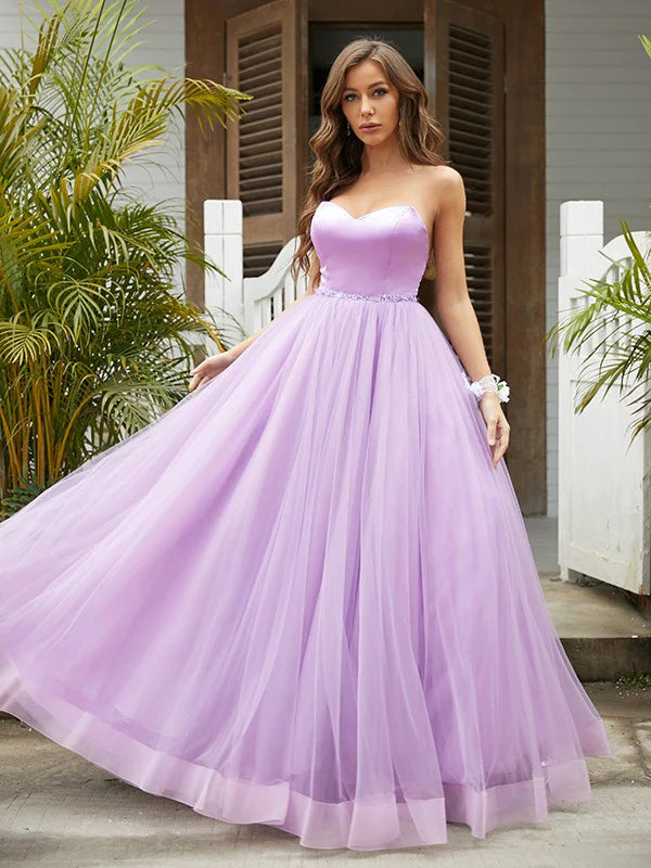 Light blue A-line princess prom dress with sweetheart neckline and tulle ruffles, front view.