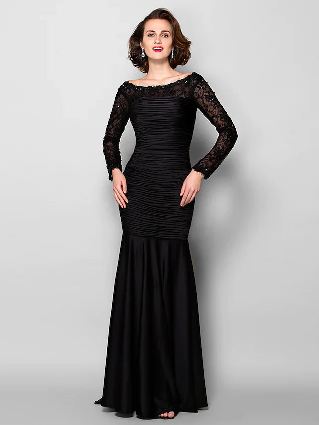 Full length view of the Mother of the Bride dress, highlighting the flowing jersey fabric.