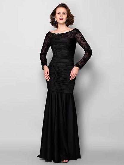 Full length view of the Mother of the Bride dress, highlighting the flowing jersey fabric.