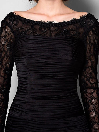 Another angle of the beautiful back of the long sleeve Mother of the Bride dress.