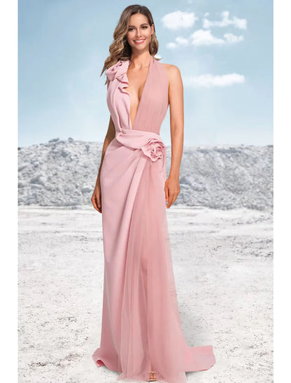 Woman in elegant mermaid halter satin ruched evening gown with sweep train, front view.