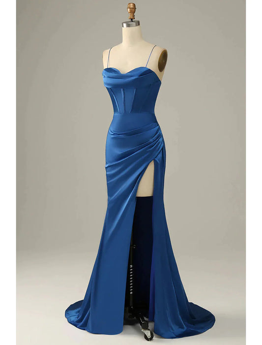 Elegant sleeveless mermaid trumpet evening gown in satin with cowl neck and ruched detailing.