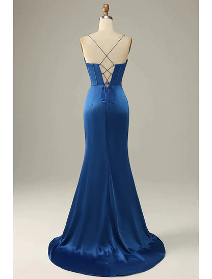 Back view of a sleeveless satin mermaid trumpet gown with ruched accents.