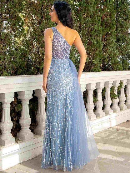 Side view of the elegant one-shoulder mermaid trumpet dress with sequin embellishments.