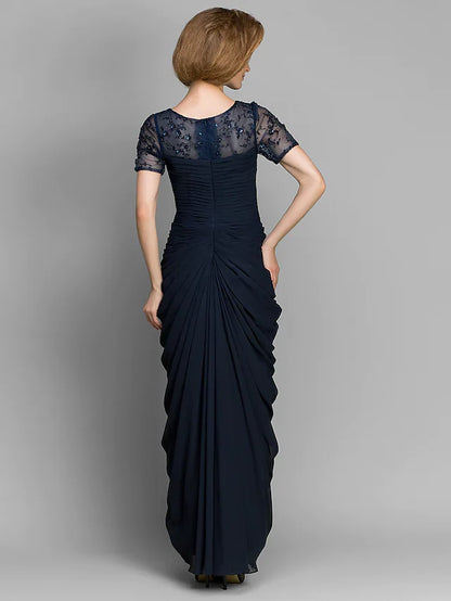 Side view of the navy chiffon mother of the bride dress with short sleeves and ruched detailing.