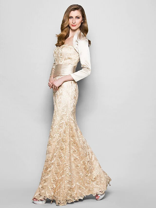 Back view of the elegant navy blue lace satin gown, highlighting its sophisticated silhouette.