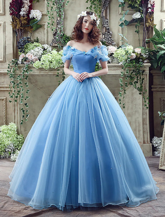 Light blue off-shoulder satin ball gown with short sleeves, intricate appliques, and a chapel train.
