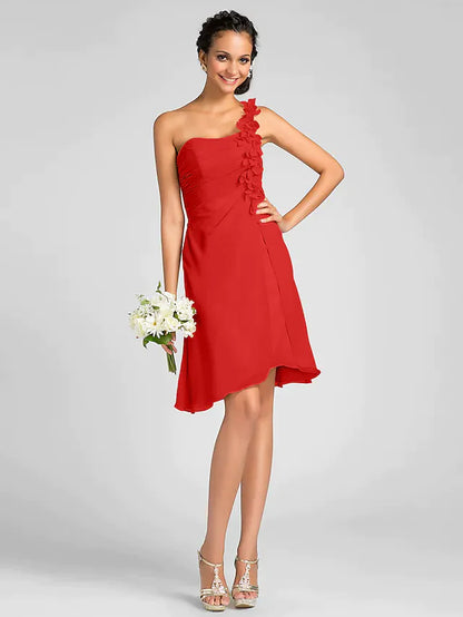 Close-up of the delicate side draping and flower embellishment on the chiffon bridesmaid dress.