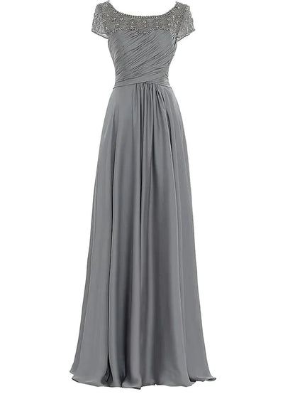 Model wearing an elegant floor-length chiffon Mother of the Bride dress with a jewel neck, pleats, and beading.