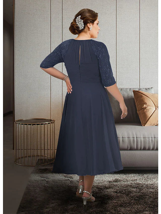 Elegant plus size A-line Mother of the Bride dress with jewel neck and half sleeves, side view.