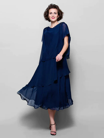 Full view of the back of the elegant plus size A-line tea length dress.