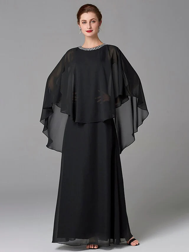 Woman in an elegant A-line jewel neck floor-length chiffon dress with beading.