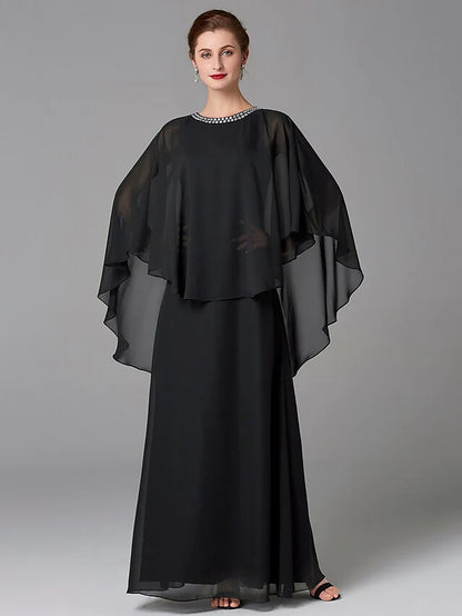 Woman in an elegant A-line jewel neck floor-length chiffon dress with beading.