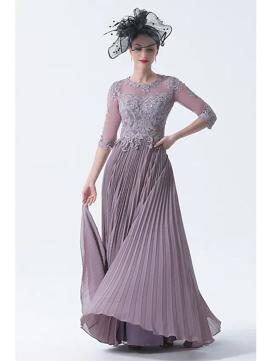 Model wearing an elegant plus size A-line Mother of the Bride dress with bateau neck and half sleeves.