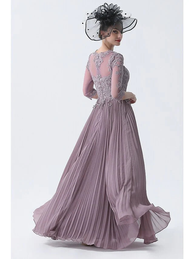 Close-up of the chiffon lace and applique details on the elegant plus size dress.