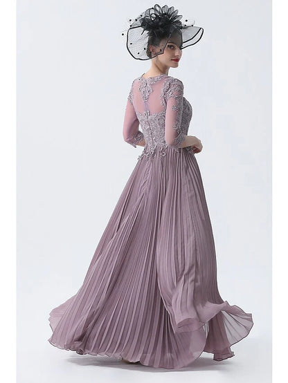 Close-up of the chiffon lace and applique details on the elegant plus size dress.