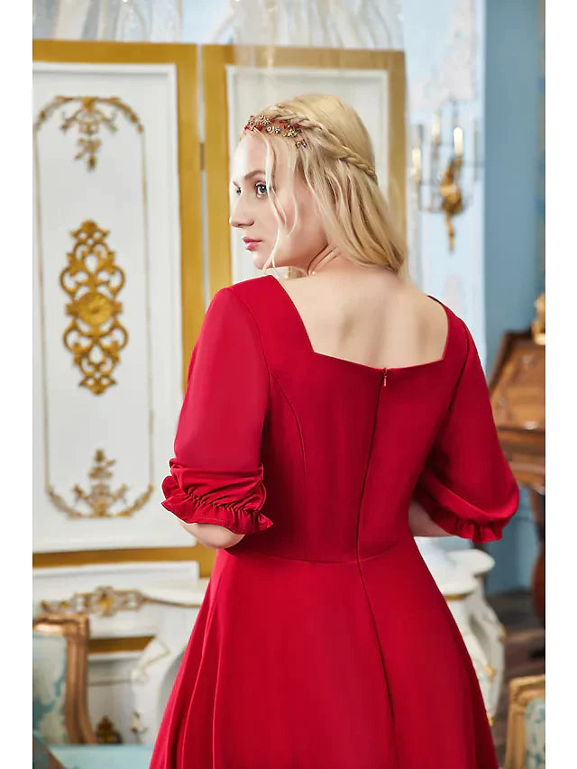 Side profile of the tea length A-line dress with flowing skirt.