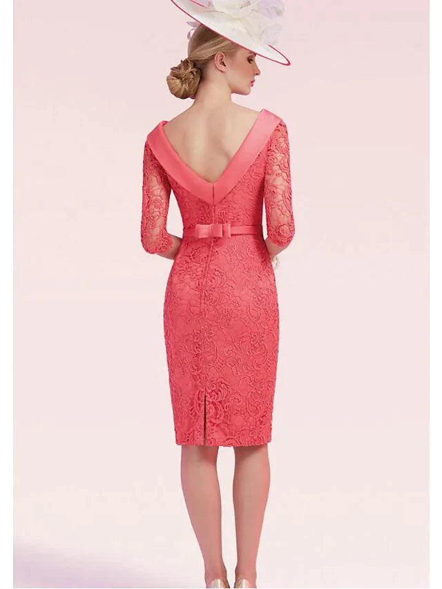 Side view of an elegant plus size knee-length dress with bateau neckline and half sleeves.