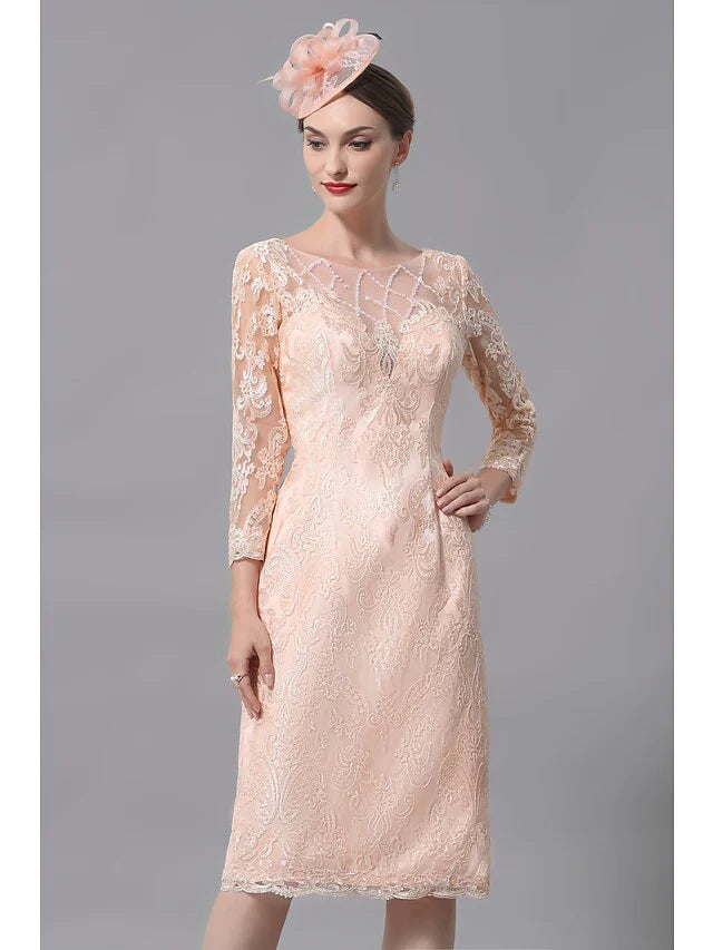 Close-up of the intricate lace and applique details on the 3/4 sleeve of the mother of the bride dress.