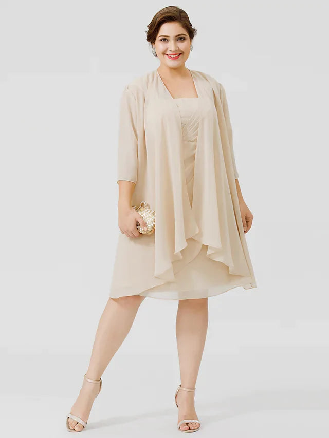 Plus size Mother of the Bride dress in navy chiffon and lace, front view.