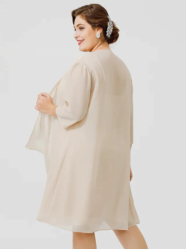 Back view of the navy plus size dress showing criss-cross straps.