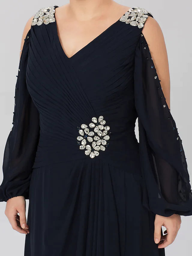 Detail of the stretch satin fabric and long sleeve design of the formal dress.