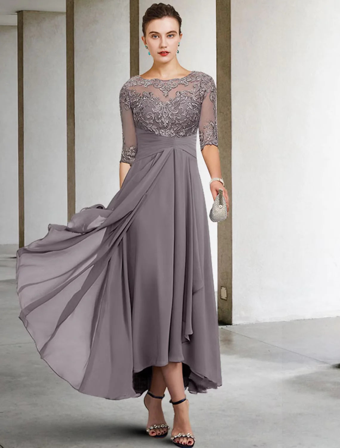 Elegant plus size Mother of the Bride sheath dress with jewel neck, short lace sleeves, and appliques.
