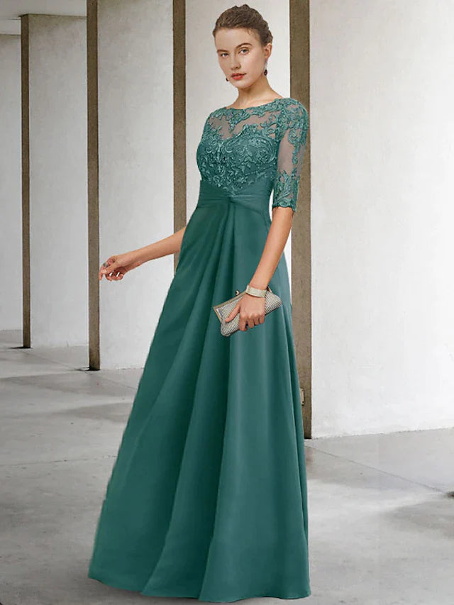Detail of the appliques and side-draped design on the elegant Mother of the Bride dress.
