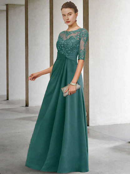 Detail of the appliques and side-draped design on the elegant Mother of the Bride dress.