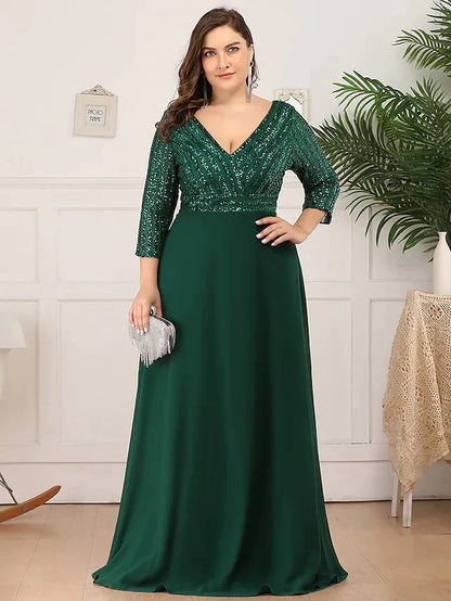 Close-up of the sequin detail and V-neckline on the mother of the bride dress.