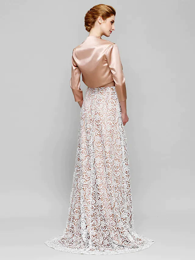 Back view of a model in the elegant charmeuse Mother of the Bride dress, showcasing the ruched design.