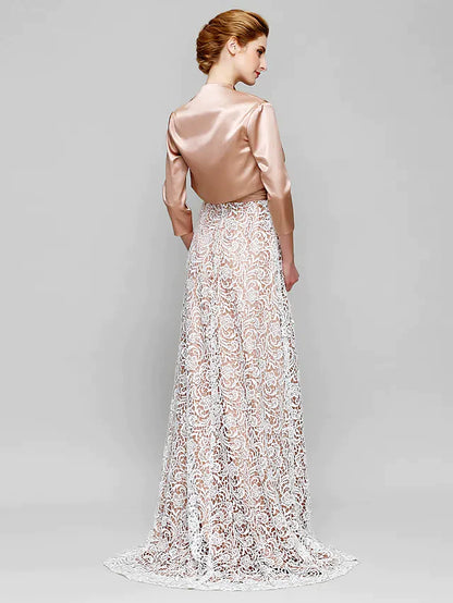 Back view of a model in the elegant charmeuse Mother of the Bride dress, showcasing the ruched design.