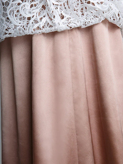 Full-length view of a model in the versatile Mother of the Bride dress with convertible strap styling.