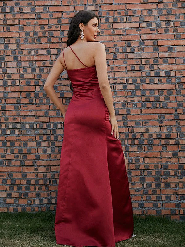 Side view of the sleeveless satin evening gown with ruched detail.