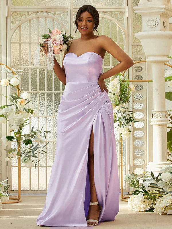 Back view of the purple ruched satin bridesmaid gown.
