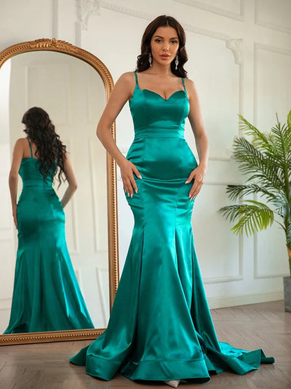 Back view of the sleeveless long satin gown with ruched details.