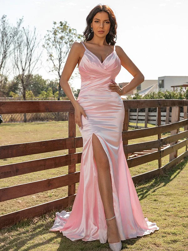 Full view of the elegant pink ruched V-neck long prom dress.