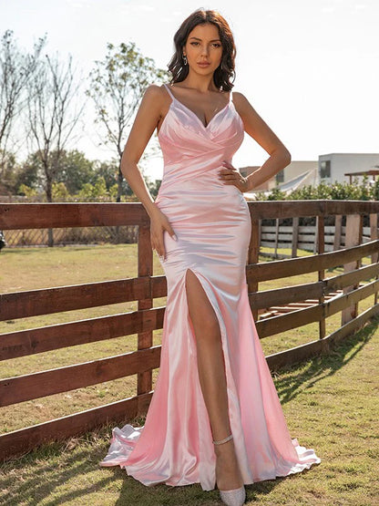Full view of the elegant pink ruched V-neck long prom dress.