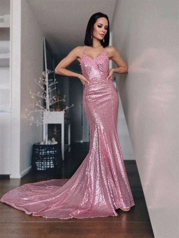 Full view of an elegant pink sequin and ruffled V-neck long prom dress.