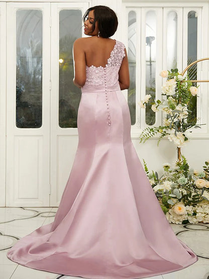 Side view of a plus size one-shoulder satin lace bridesmaid dress.
