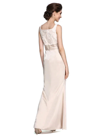 Close-up of the square neckline and long sleeve with lace detail.