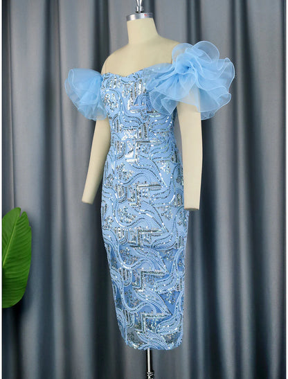 Close-up of the floral sequin detail on the off-shoulder party dress.