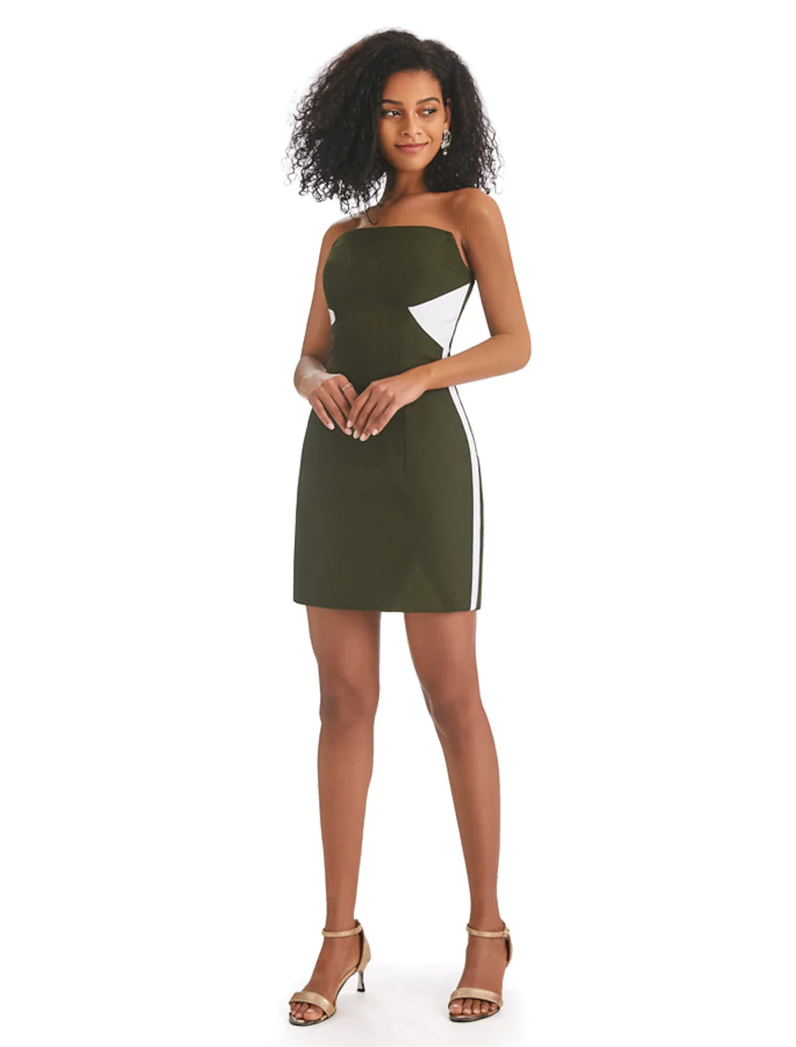 Woman wearing an elegant strapless color block mini dress with fringe.