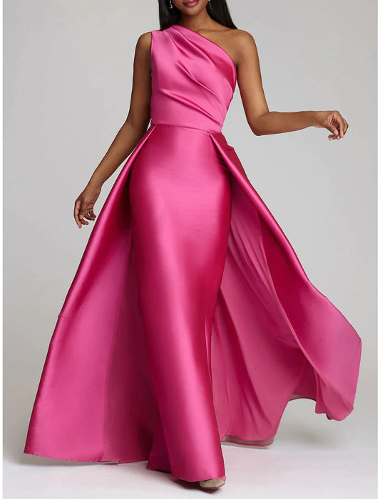 Model wearing a red one-shoulder satin sheath gown with an overskirt.