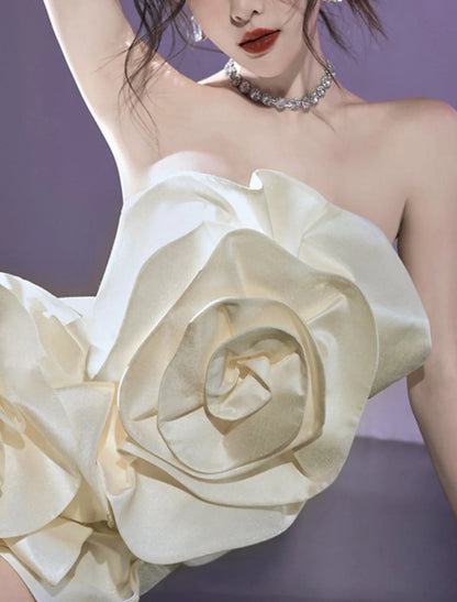 Side view of a model in a floral satin mini party dress.
