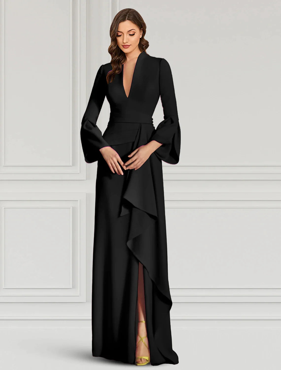 Woman posing in a black sheath dress, demonstrating the stretch fabric and movement.