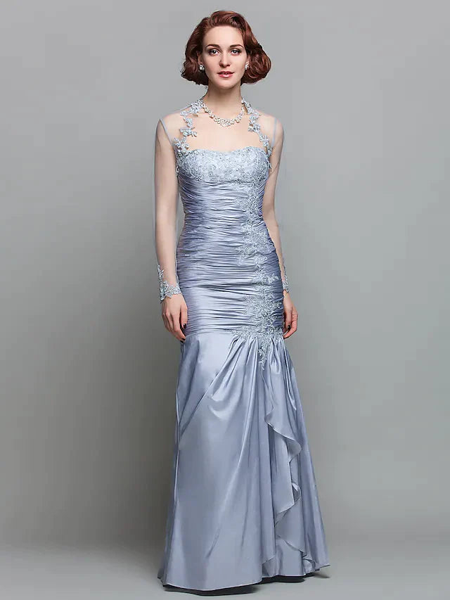 Elegant strapless Mother of the Bride dress in dark blue with a matching long-sleeve wrap.