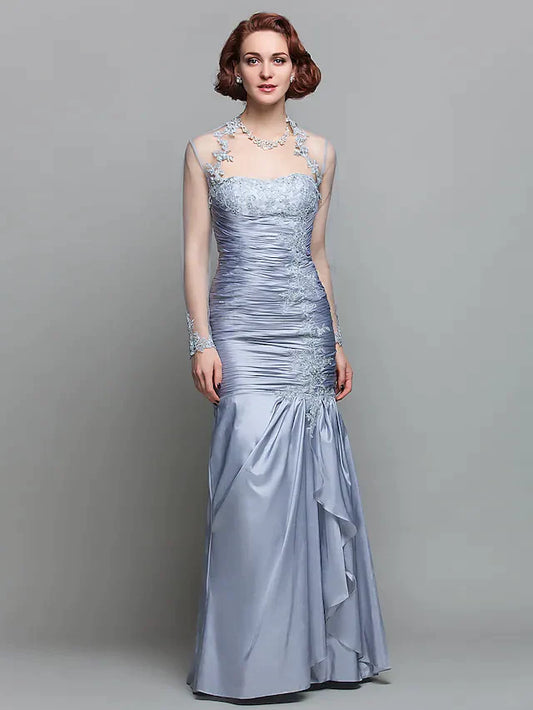 Elegant strapless Mother of the Bride dress in dark blue with a matching long-sleeve wrap.