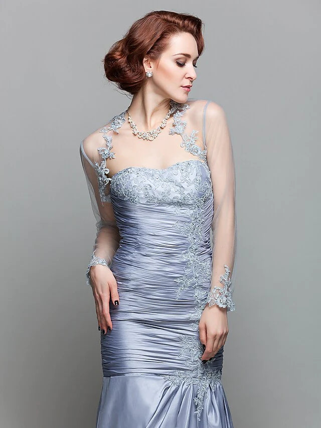 Back view of the floor-length lace and taffeta Mother of the Bride gown.